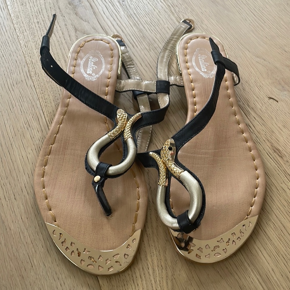 Black and gold flat sandals size 8.5